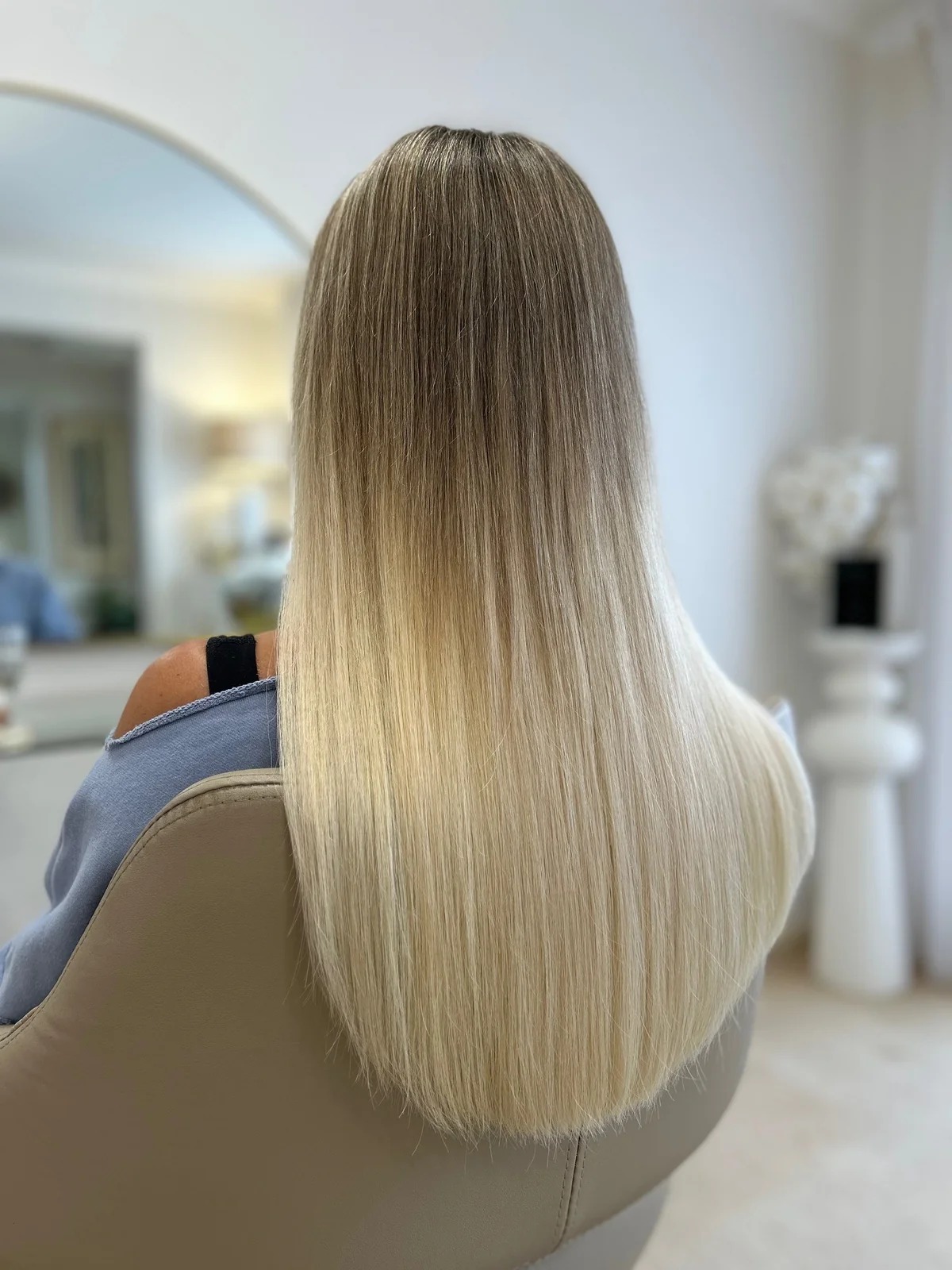 18 inch invisible weft hair extensions on a petite client