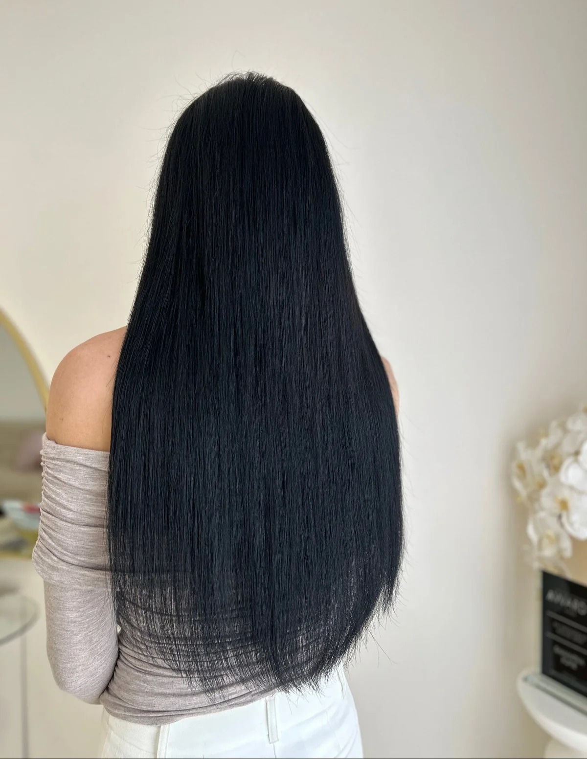 24 inch invisible weft hair extensions on a tall client